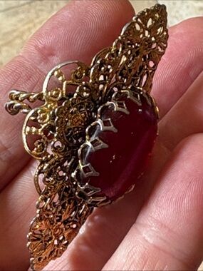Vintage Adjustable Gold Filigree Ring with Deep Red Cabochon